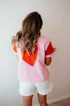 SHE'S SHOWING UP TEE: M