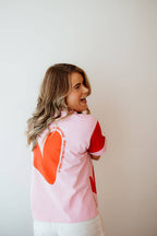 SHE'S SHOWING UP TEE: XS